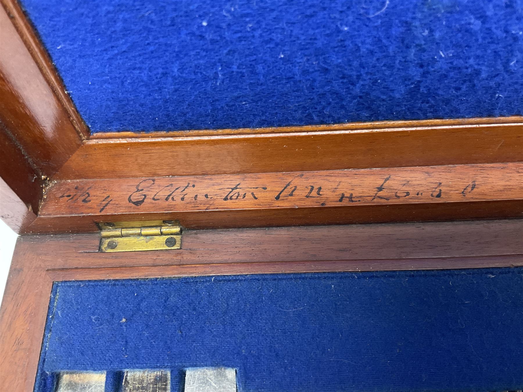 Victorian silver plated dessert set by Elkington & Co for twelve place settings, each reeded handle with vacant cartouche, each with Elkington & Co mark, date letter for 1861, and registration lozenge, contained within a mahogany case with vacant brass cartouche to the hinged cover, opening to reveal a Royal blue baize lined interior with removable tray, case H6cm W29.5cm D26.5cm