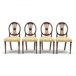 Bevan Funnell Reprodux - Regency design set of ten mahogany dining chairs, oval backs with central splat with rose motif, serpentine seat upholstered in damask fabric, raised on turned supports
