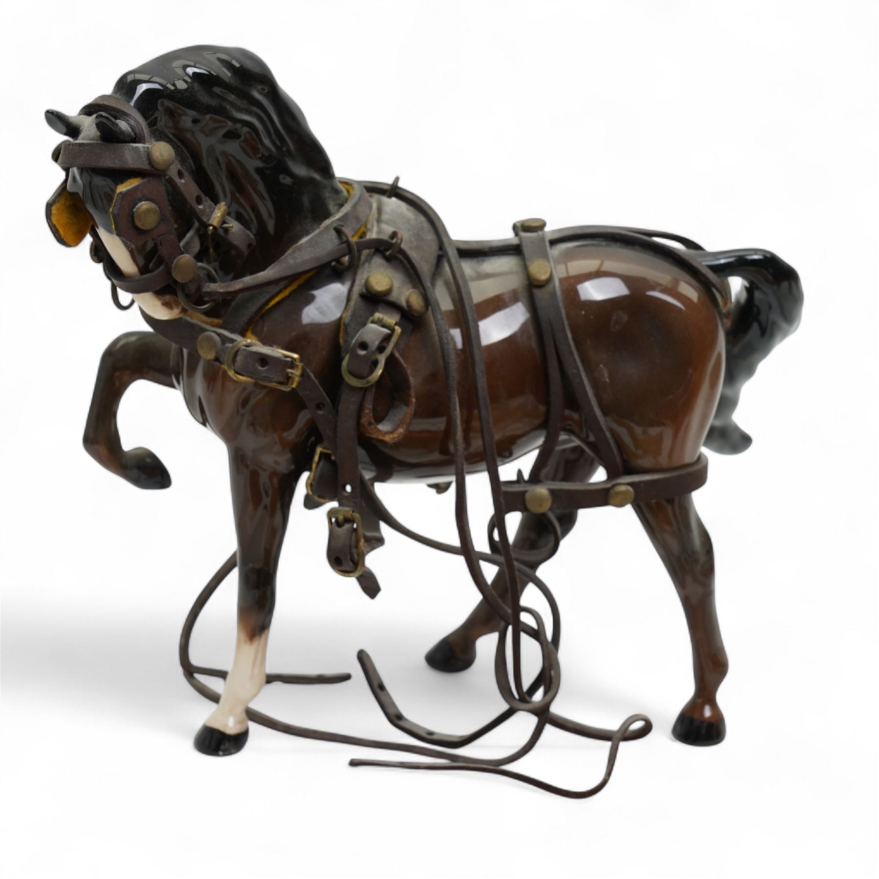 Six Beswick dogs comprising St Bernard No.2221, Greyhound No.972, Alsatian No.969. Whippet No.1786B, Cairn No.1055A and Retriever No.1855, two Beswick foxes and a harnessed horse