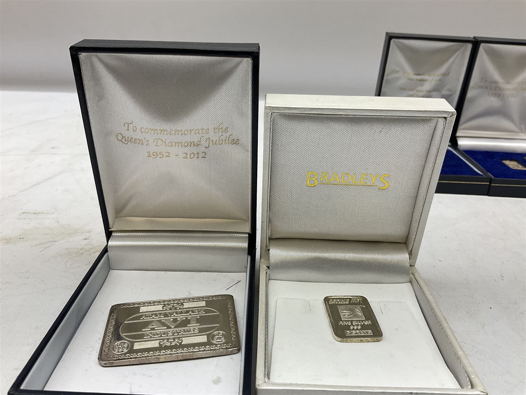 Quantity of silver comprising two 2012 Diamond Jubilee silver commemorative plaques stamped 999, hallmarked Birmingham 2012 with Jubilee stamp, together with a Prince William and Catherine Middleton silver bar stamped 999, Refine Met Fine Silver 999 bar and Atam Vallabh AVI Industries bar stamped fine 999, all tested, total weight approx 45.5g