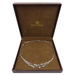 18ct white gold three row diamond necklace, twenty-five bezel set round brilliant cut diamonds, total weight 1.20 carat, hallmarked, retailed by Guest & Philips, boxed with insurance certificate 