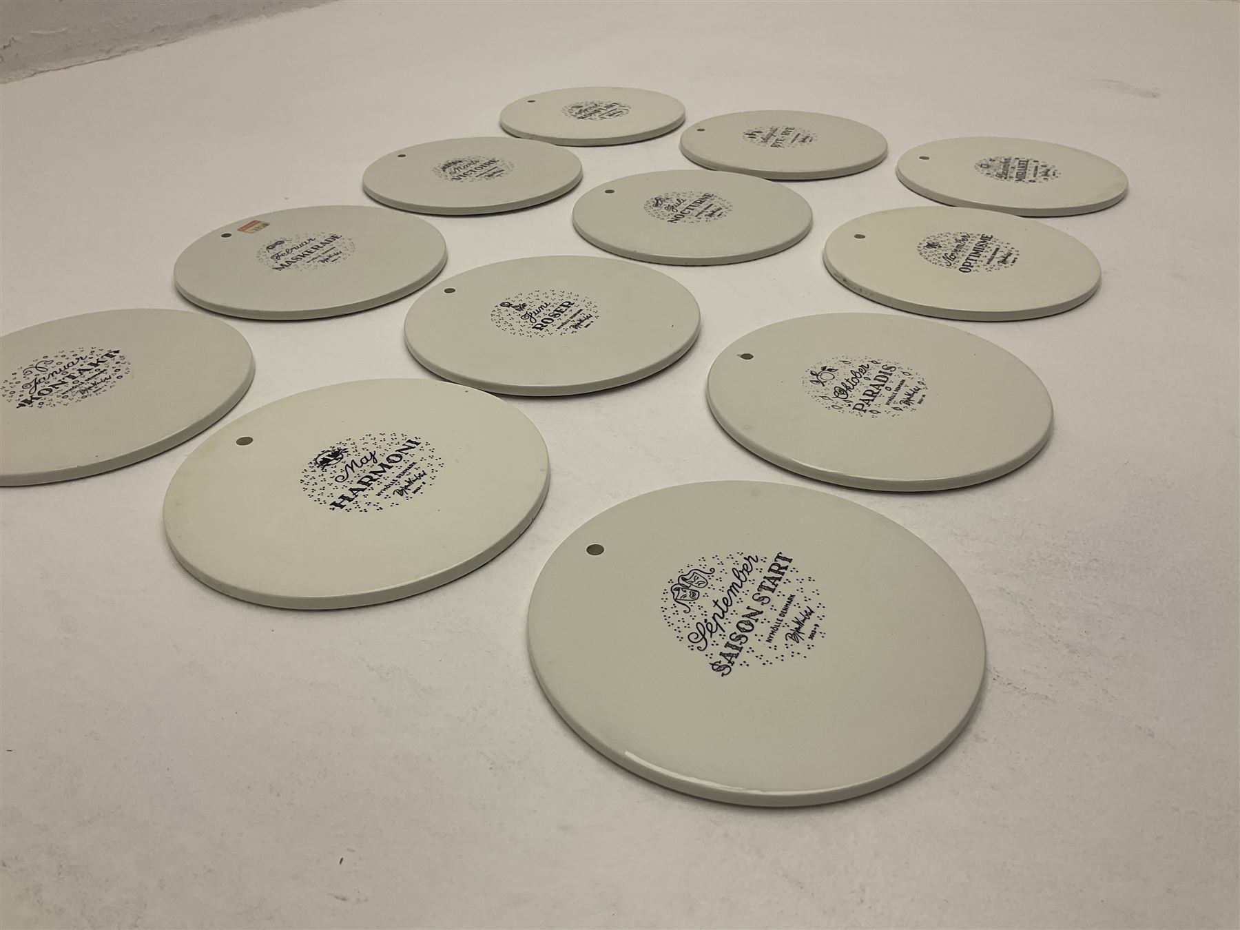 Bjorn Wiinblad for Nymolle Denmark set of twelve calendar wall plaques, D15cm