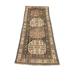 Turkish rug, overall geometric design, the field with quadruple medallions and decorated with repeating geometric motifs