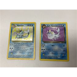 Collection of Pokemon trading cards, mostly 1999 Wizards Pokemon cards to include holo Charizard 4/102, first edition holo Machamp 8/102, further holographic cards; Dark Flareon 35/82 and Dark Vaporeon 45/82, cards from themed sets and 4th edition prints; 1998 Electronic Pokédex with cardboard boxes for themed decks Blackout, Overgrowth and Power Reserve Jungle, along with a large quantity of energy and trainer cards 