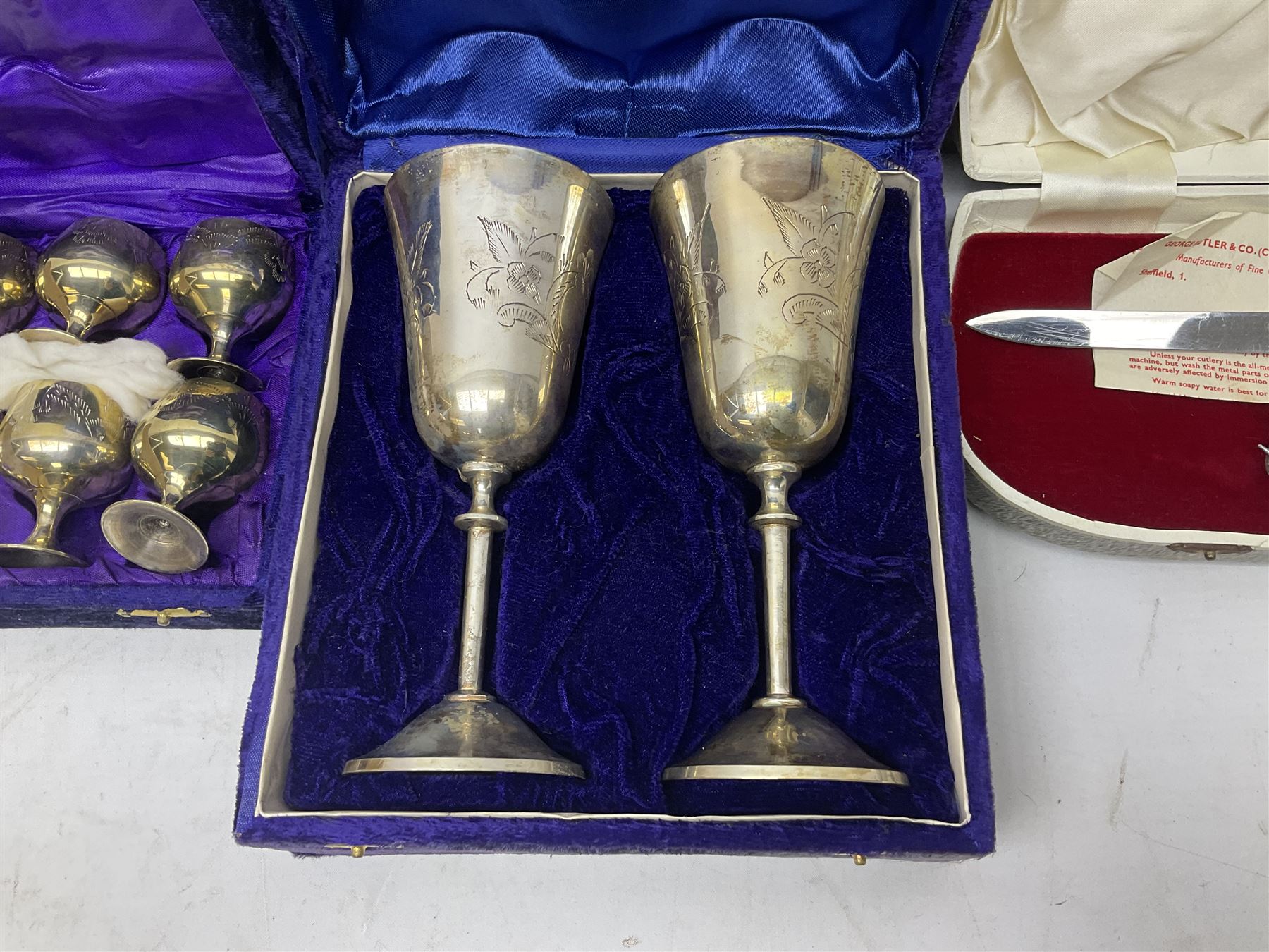 Hunting horn, with silver plated mounts, Ronson red glass table lighter, silver plated bowl, goblets and liquer glasses and other collectables