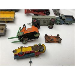 Dinky - twenty-six unboxed and playworn die-cast models including Foden Regent Tanker, two Foden lorries, Pressure Refueller No.642, Snow Plough, Elevator Loader, Foden Dump Truck, Blaw Knox Bulldozer and other commercial vehicles