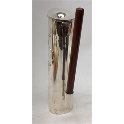 A silver plated Ravissant water jug, of cylindrical form with wooden open handle, detailed with a group of vases, marked beneath Ravissant, H25.5cm.  