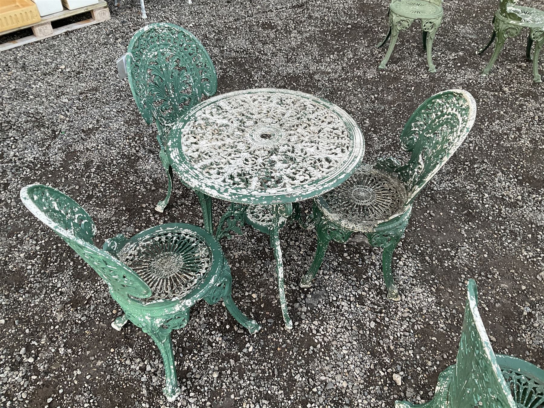Painted aluminium circular garden table and three chairs - THIS LOT IS TO BE COLLECTED BY APPOINTMENT FROM DUGGLEBY STORAGE, GREAT HILL, EASTFIELD, SCARBOROUGH, YO11 3TX