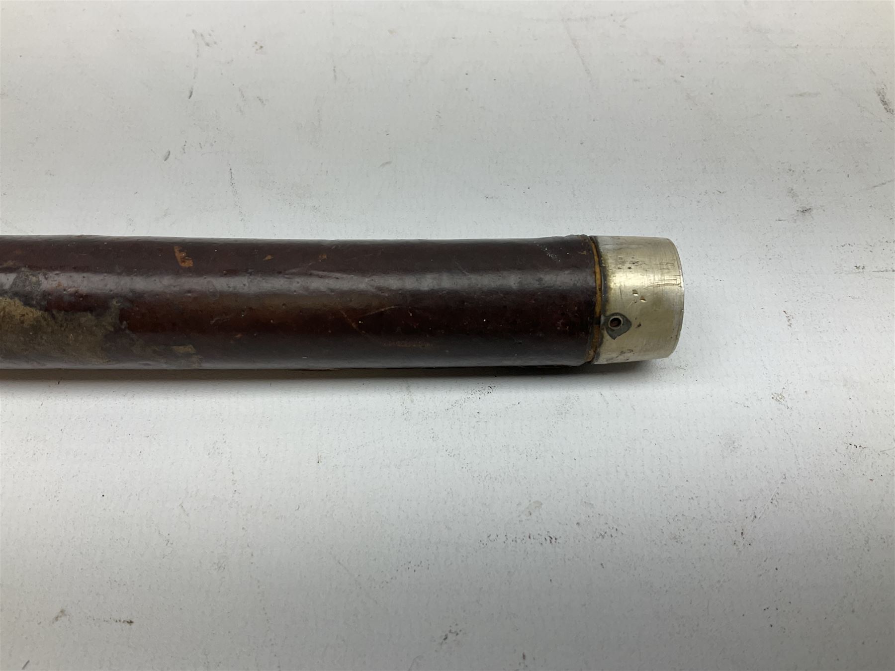 Early 20th century officer's swagger type leather covered sword stick, the 33cm etched single fullered blade marked Wilkinson Pall Mall, with carrying strap L60.5cm