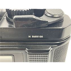 Nikon FM2n camera body, serial no. N8683100, with 'Nikon Zoom-NIKKOR 35-70mm 1:3.3-4.5' len, serial no. 2236565, Nikon MF-16 data back, serial no. 212905 and Nikon MD-12 Motor Drive, serial no 1570382 