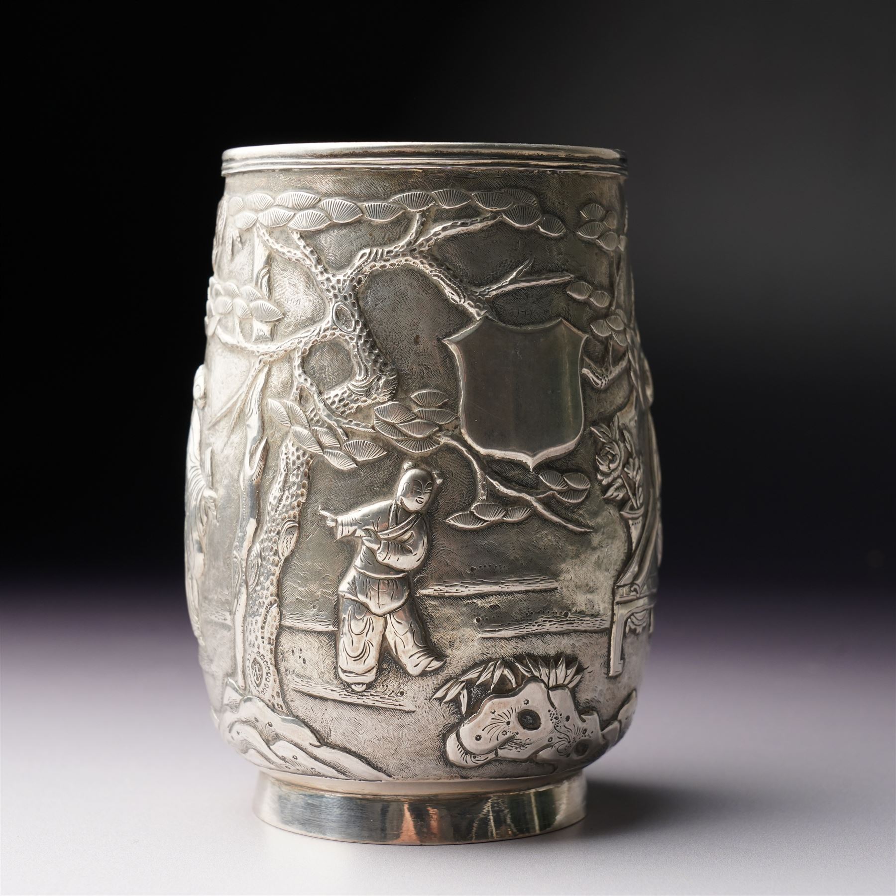 Chinese export silver mug embossed with figures and landscape with