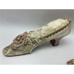 Pair of 19th century ivory silk satin ladies shoes, with rosette to the vamp, with pink silk satin heel, L23cm