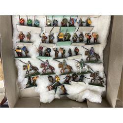 Painted metal wargame figures - over four hundred including Normans and Saxons, Romans, British Tribes etc; together with a quantity of part-painted and unpainted figures, battlefield weapons and accessories etc; average size 25mm