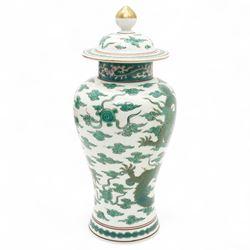 Pair of Chinese 20th century famille verte vases and covers, decorated with dragons among flaming pearls, H32cm (2)