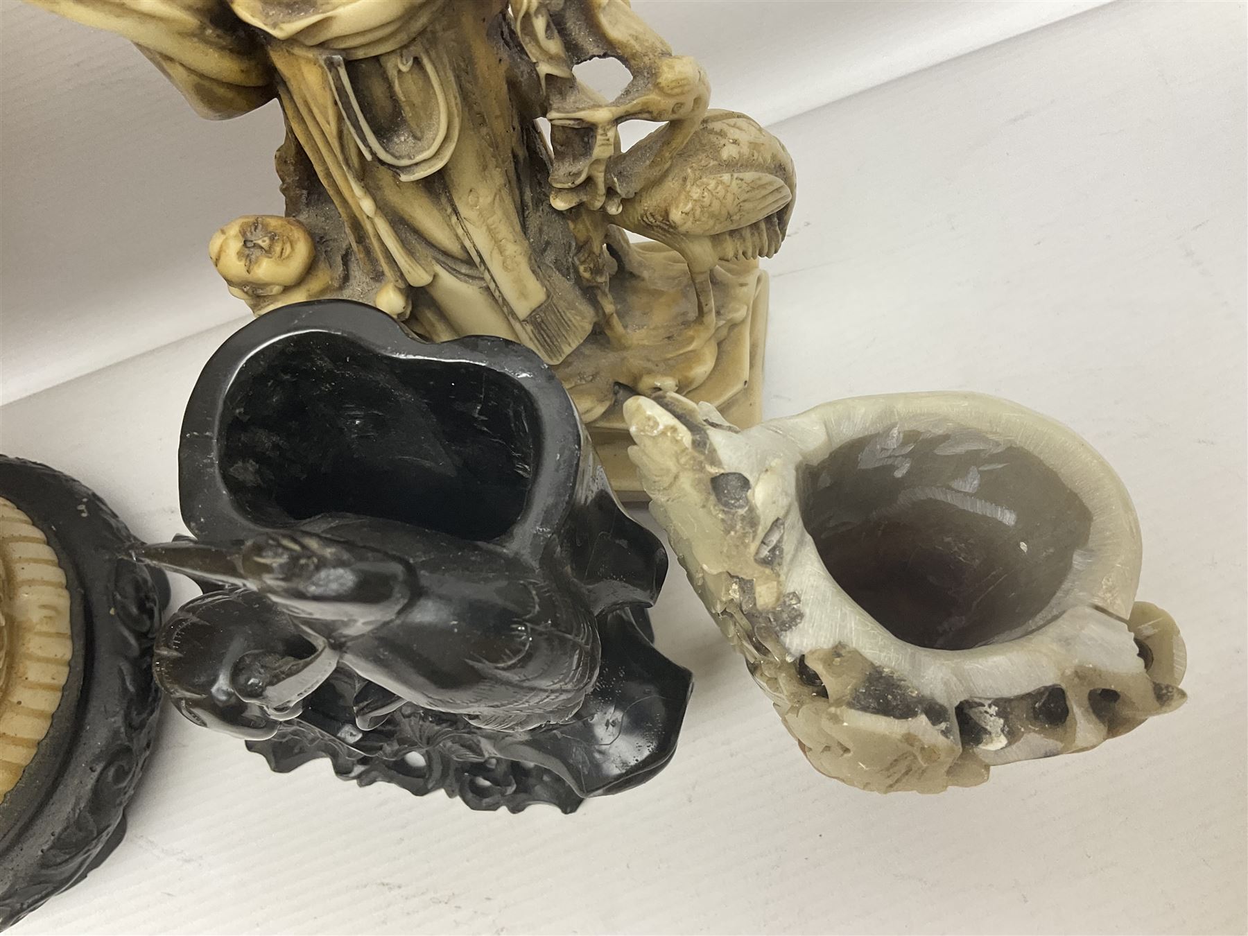 Collection of hardstone and soapstone, including hardstone seal carved temple dogs finial, inscription on base, together with inkwells, vases etc  