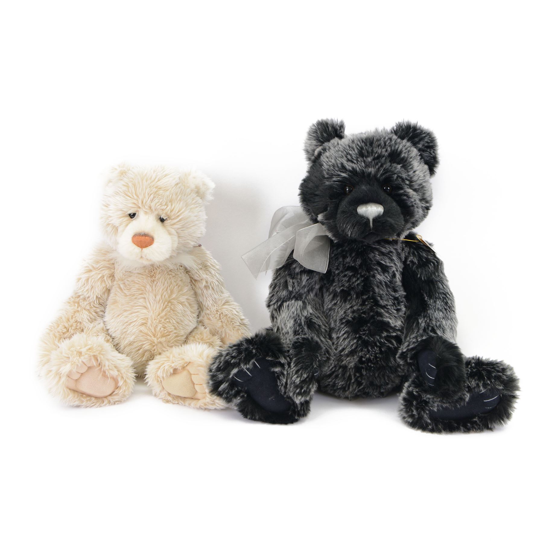 Two Charlie Bears plush jointed teddy bears, to include limited edition 'Porridge', with cream fur and spoon necklace and 'Brooklyn', with black and grey fur and silver bow, both designed by Isabelle Lee, with tags, tallest H51cm
