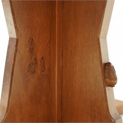 Rabbitman - circular oak dining table, adzed oak octagonal concave dining table, raised on a cruciform base, the supports and sledge feet also adzed, carved with rabbit signature, by Peter Heap of Wetwang