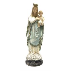 An early 20th century painted plaster figure modelled as Madonna and ...