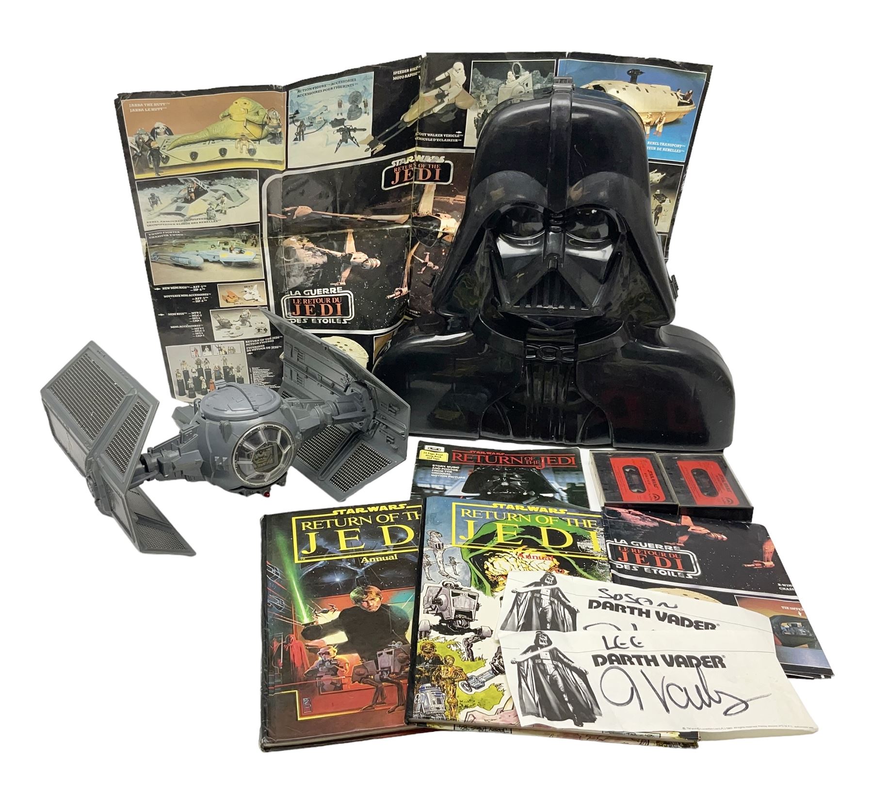 Star Wars - Darth Vader TIE-fighter; Darth Vader head and shoulder shaped figure collection box; 1983 & 1984 Return of the Jedi Annuals; Read Along Book and Tapes; and two posters