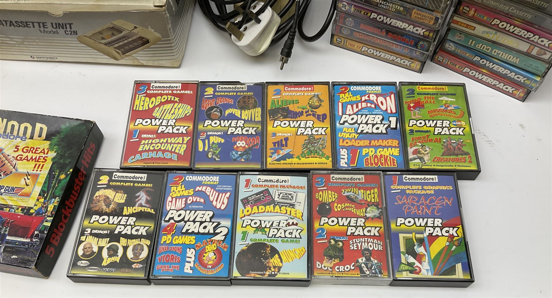 Commodore 64 games computer with boxed 1530 Datassette Unit Model C2N, two joysticks, over seventy games and twenty-two Commodore magazines; polystyrene box inner and card slip-case