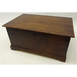 Victorian oak box in the form of a Coffer, lid with strapwork hinges, dovetail jointed body on shaped bracket feet, W37cm, H19cm, D23cm  