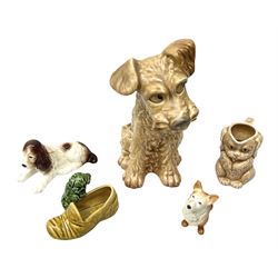 Collection of Sylvac dog figures to include an Art Deco dog jug, Corgi, Spaniel, seated Westie etc (5)