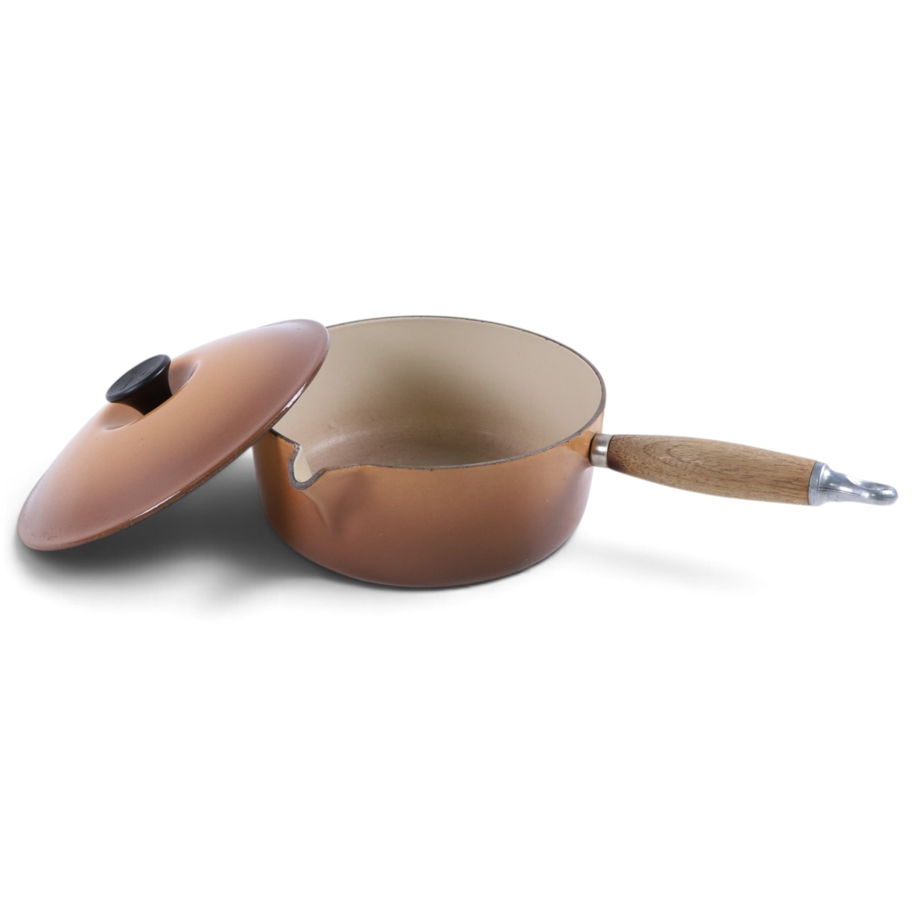 Set of three Le Creuset pans and lid