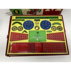 Meccano - Outfits 4, 6 & 7 with red and green parts; Outfits 4 & 6 virtually fully stocked and Outfit 7 containing large quantity of loose parts; Outfits 4 & 7 with instruction manuals; all boxed (3)