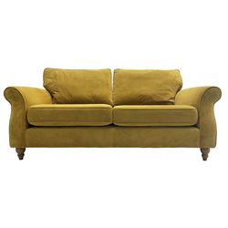 Next Furniture - traditional shaped three-seat sofa, upholstered in mustard velvet, rolled arms with pipping, on turned front feet