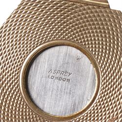 Asprey, 9ct gold hexagonal cigar cutter, hallmarked, with engine turned decoration  