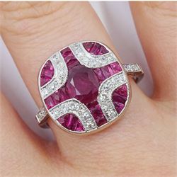 Platinum vari-cut ruby and diamond pave set oval ring
