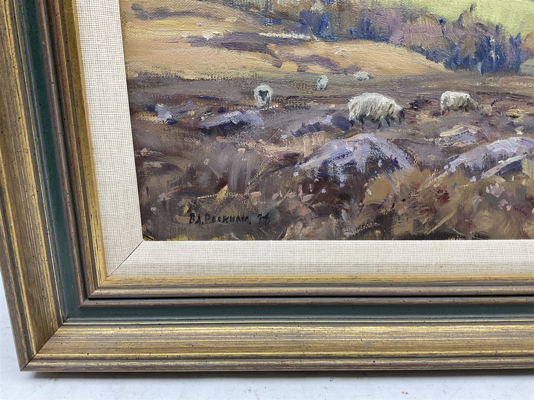 Barry Arthur Peckham (British 1945-): Sheep Grazing on Sleights Moor, oil on board signed and dated '74, 29cm x 50cm