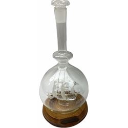 Lichfield glass sculpture, ship in a bottle H31.5cm together with The discovery of America commemorative compass, a quartz mantel clock and a selection of other collectables. 