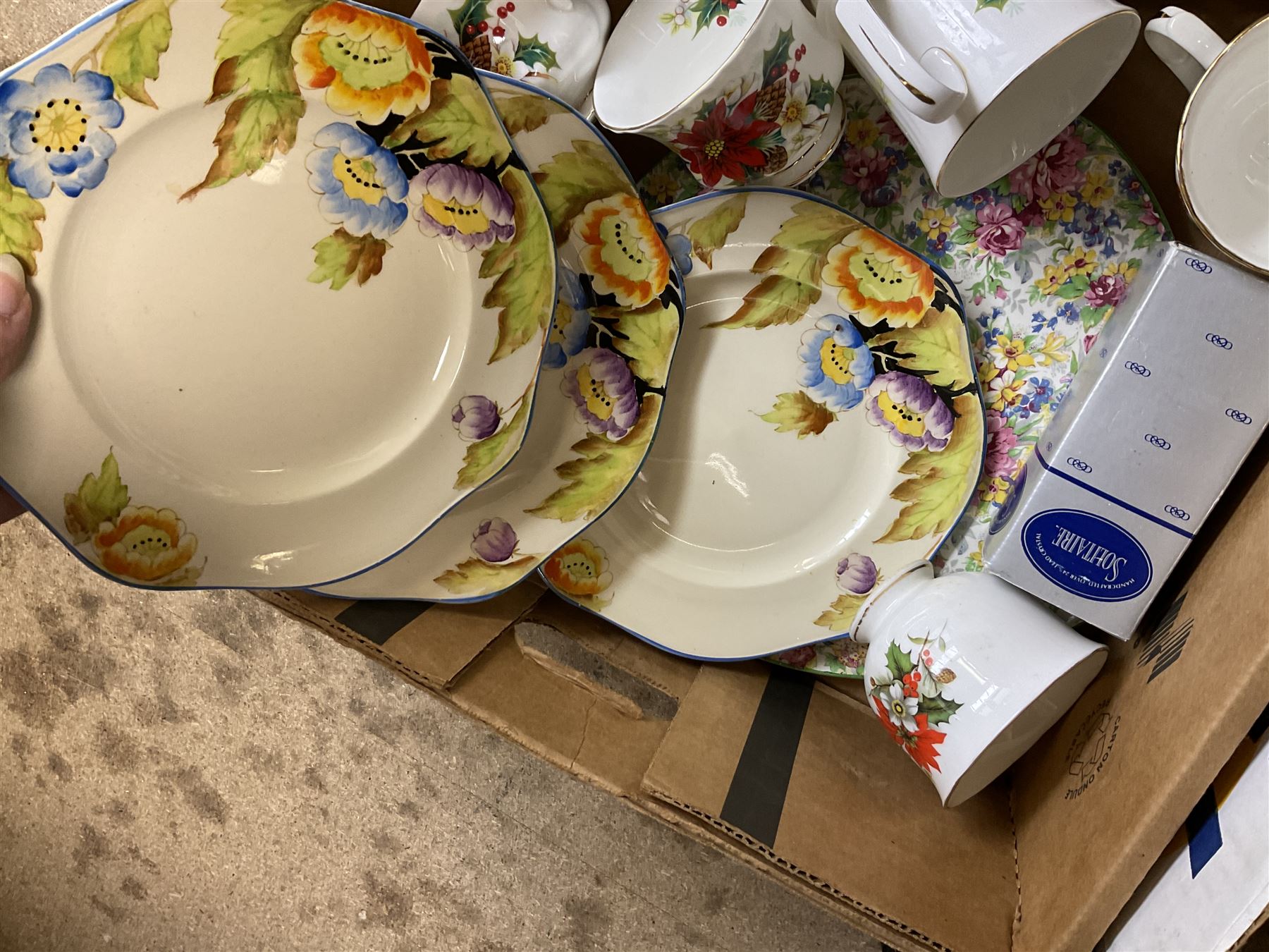 Royal Albert Poinsettia pattern part tea service, including tea cups, mugs, dessert plates, cake plate, together with James Kent plates, Crown Staffordshire Vermouth ceramic decanter label, glassware etc, two boxes 