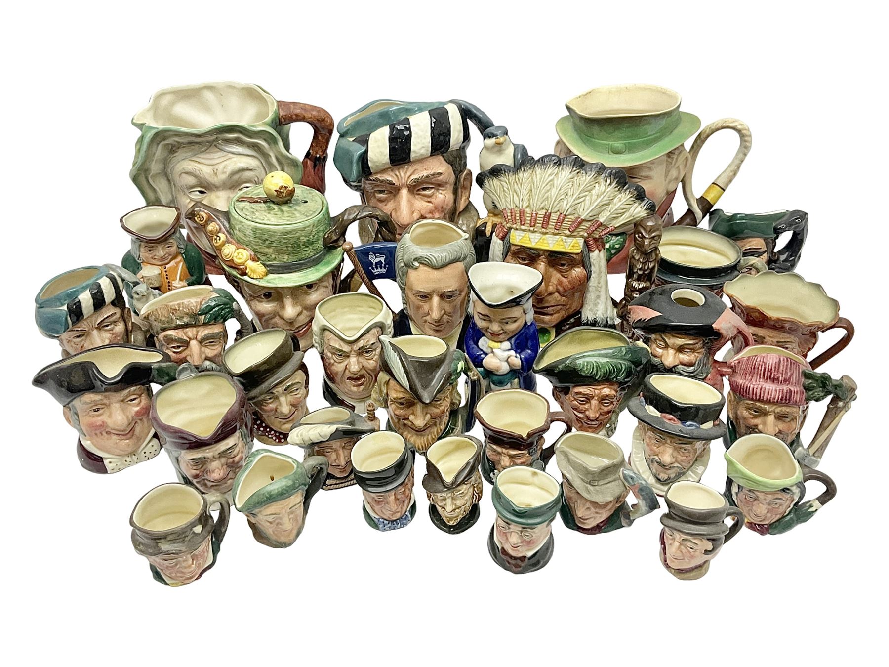 Collection of Royal Doulton and Beswick character jugs of various sizes, including North American Indian D6611, The Falconer D6533,  Tony Weller 281, Sairey Gamp 371 etc
