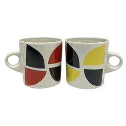 Sir Terry Frost (British 1915-2003): Two earthenware mugs, white glaze with geometric design, one yellow and black colourway, the other red and black colourway H8.3cm (2)