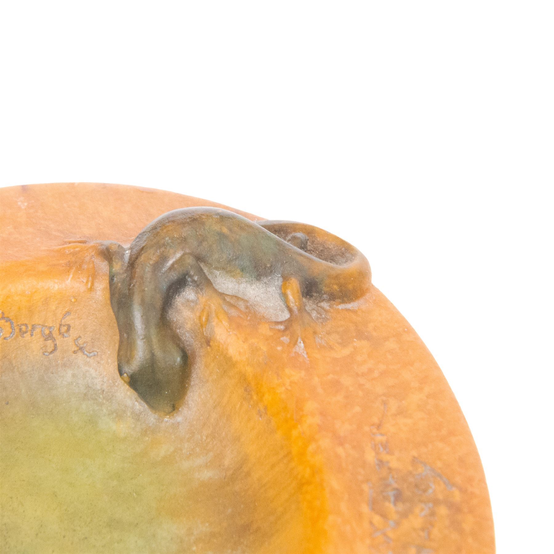 Amalric Walter (1870-1959) and Henri Berge (1868-1936), Nancy, France, circa 1920, pate de verre, Salamander ashtray, bearing moulded mark 'A Walter Nancy' and incised mark 'Berge sc.', D12cm

Note: Almaric Walter, born in Sèvres near Paris, exhibited at the Salon des Artistes Françaises in 1895 and 1903, and in 1908 moved to Nancy where he established his own workshop within the Daum glassworks. There he worked closely with Daum designers, including Henri Bergé. This ashtray is an example of Walter’s pâte-de-verre technique.

Provenance: From the collection of Andrew Chichester Everitt.