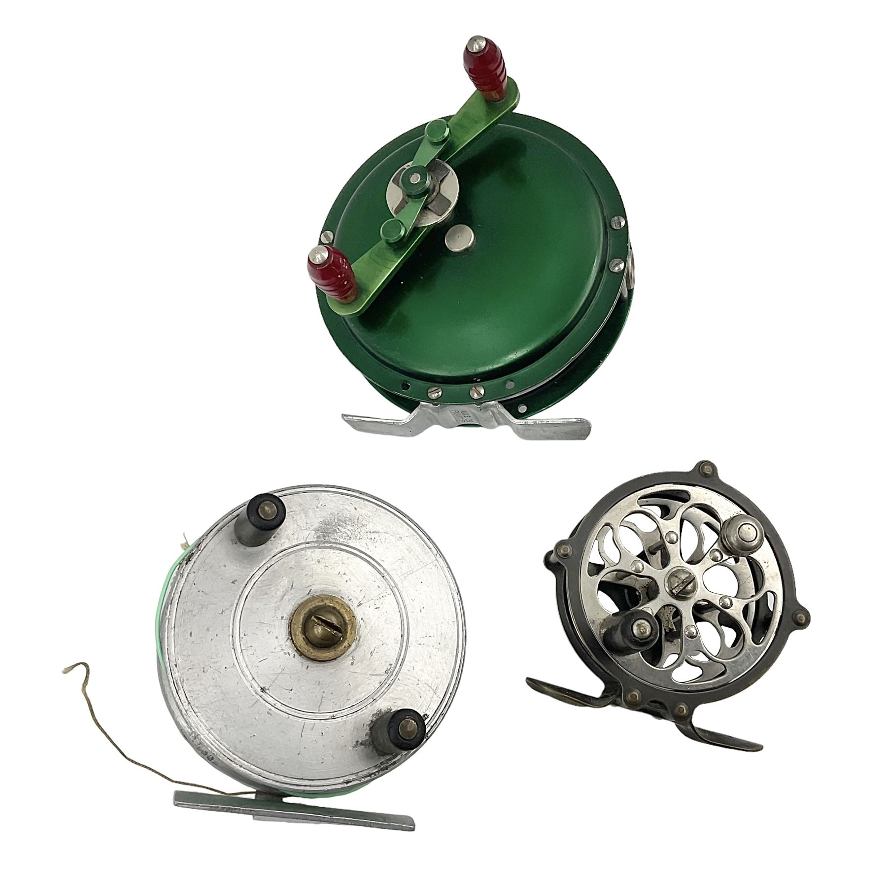 Three fishing reels, including American Pflueger progress bulldog size 60  brass and chrome skeleton fly reel, with wooden handle; Maginot 106 fly reel  and an alloy reel (3) - Decorative Antiques & Collectors