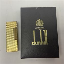 Dunhill gold plated dress lighter, in original fitted case with paperwork, together with a Dunhill rolagas lighter