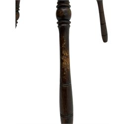 Late 19th century oak stool, rectangular dished top relief carved with floral lunettes and central insignia, on turned splayed supports