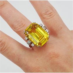 Palladium natural yellow sapphire ring, set with three baguette and round cut diamonds either side, sapphire approx 28.00 carat, with The Gem & Pearl Laboratory report stating no evidence of heat treatment, origin opinion Sri Lanka, colour transparent yellow