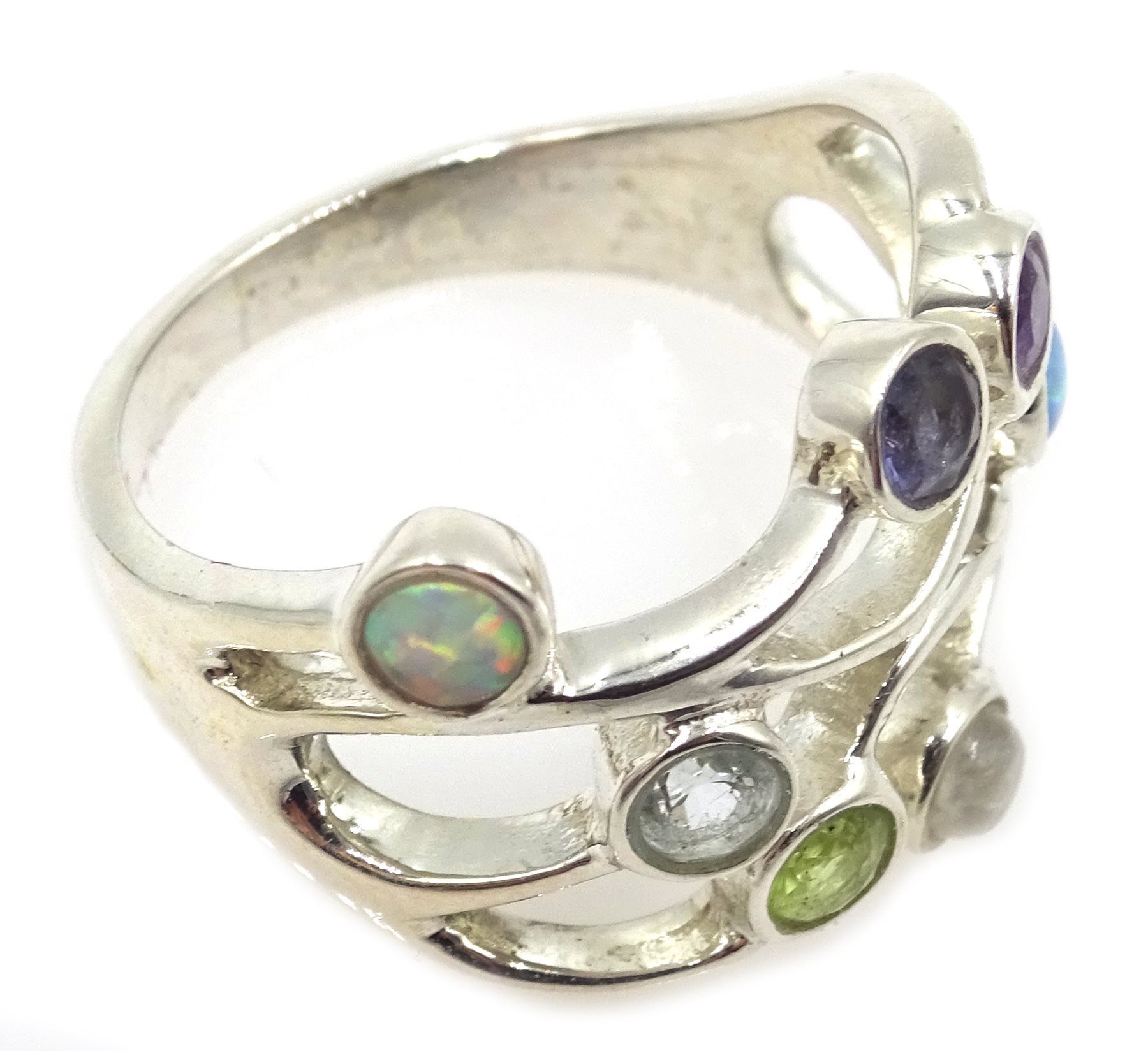 Silver multi-gem set ring, including amethyst, peridot, opal and moonstone, stamped 925