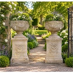 Pair of quality Neoclassical design Haddonstone cast stone garden urns, the globular  body...