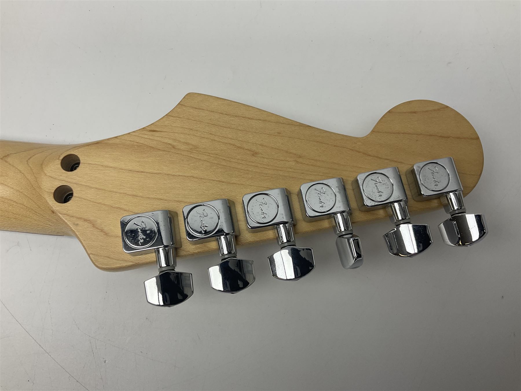 Mexican Fender Stratocaster electric guitar in black c2003 with Floyd Rose tremolo system, serial no.MZ3129600; L98cm; in Freestyle fitted case with 2006 Diamond Anniversary booklet