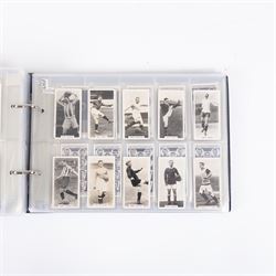 Collection of Edwardian and later Football related trading and cigarette cards, including forty-nine of fifty 1906 Ogden's Football Club Colours, 1922 PALS Footall series, ninety of one hundred 1925 Gallaher Famous Footballers, complete set of forty-four 1926 Ogden's Captains of Association Football Clubs and Colours, complete set of fifty 1927 Players Football Caricatures by MAC,  complete set of fifty 1927 Players Football Caricatures by RIP,  complete set of fifty 1930 Players Association Cup Winners, complete set of 50 1933 Ogdens AFC Nicknames etc, housed in brown cigarette card album