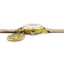  Omega gold-plated wristwatch on hallmarked 9ct gold bracelet with 9ct gold St Christopher pendant,  an early 20th century 9ct gold wristwatch on plated bracelet  