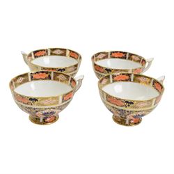 Royal Crown Derby imari patter 1128, six coffee cups and saucer, one side plate and oval twin handled dish