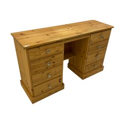 Solid pine twin pedestal desk, fitted with eight drawers