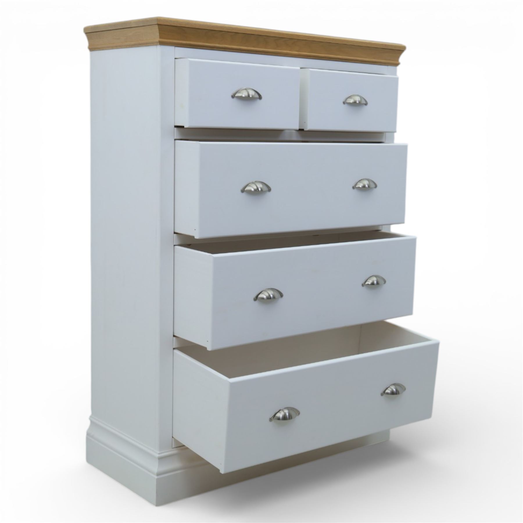 Modern chest of two short and three long drawers in white finish with oak moulded top, with metal cup handles, raised on a moulded plinth base