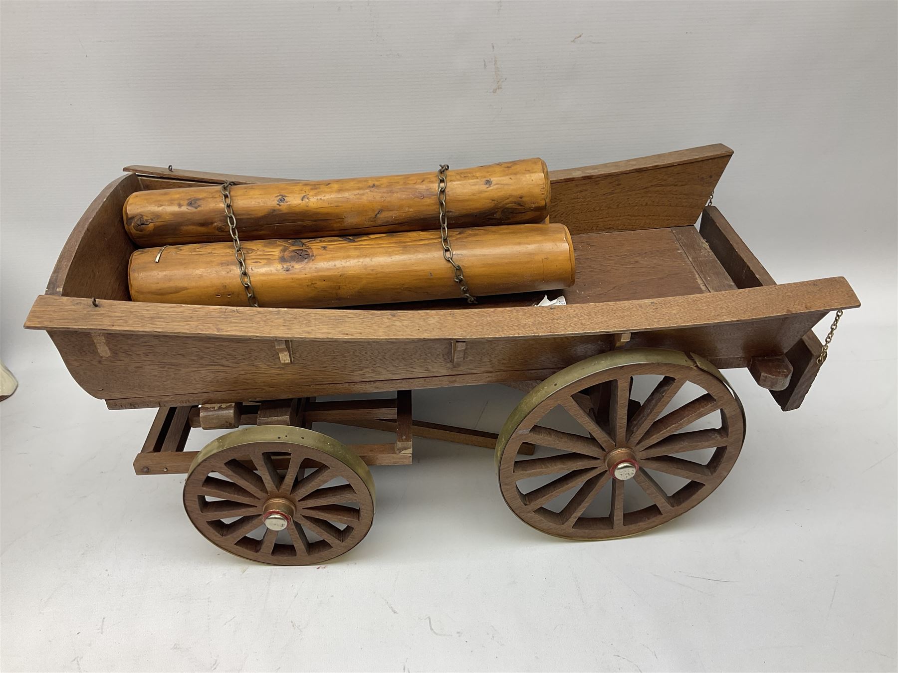 Four Melba Ware Shire horse figures and another similar, and three wood carts